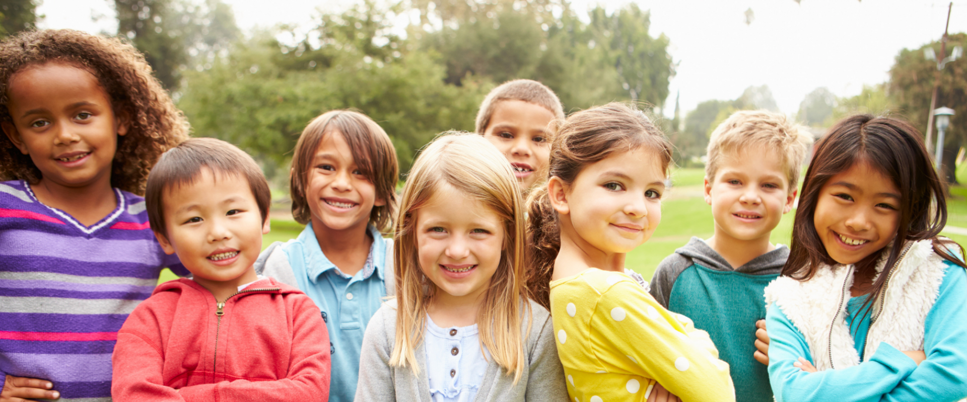 a group of children smiling